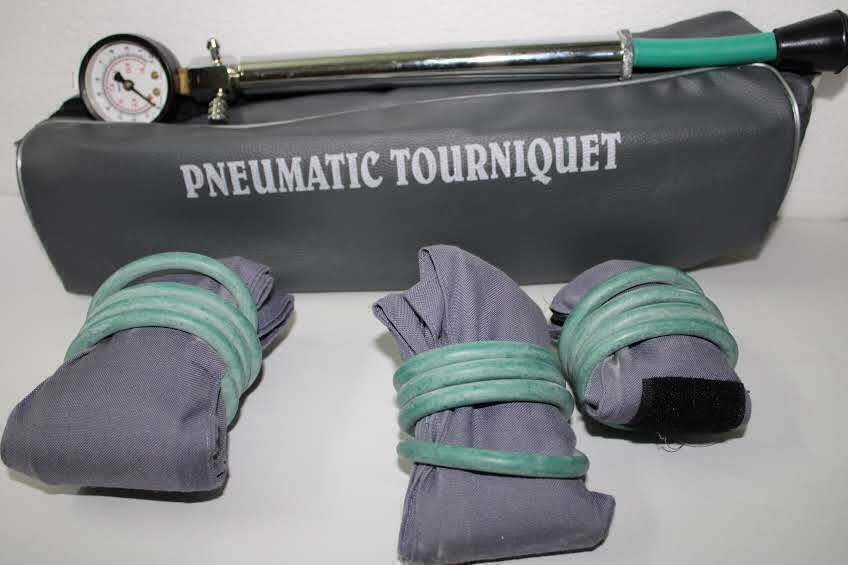 Manual pneumatic tourniquet system with cuff, inflation bulb and pressure gauge