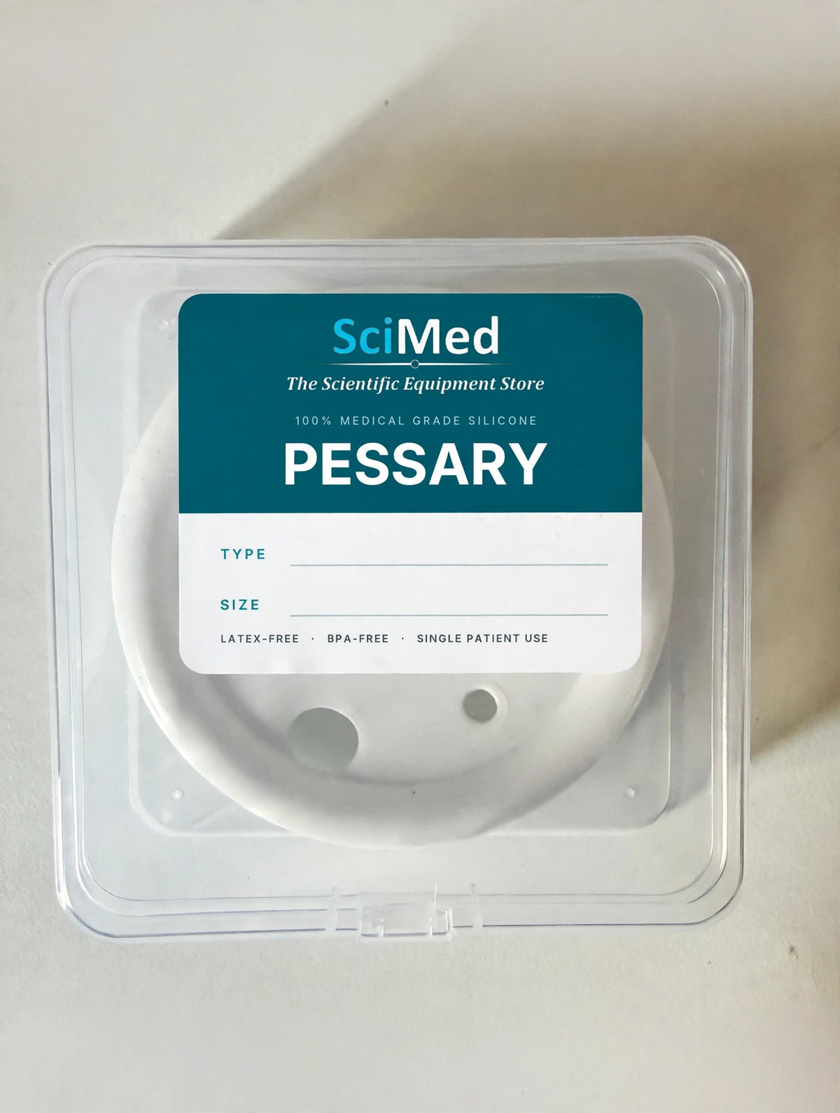 SciMed pessary case closed, top view — snap-shut lid with SciMed label